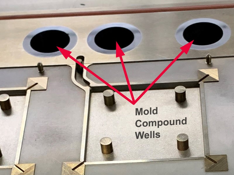 Mold compound wells close-up